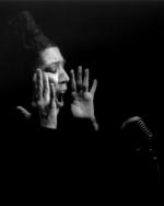 Photo of woman singing alone