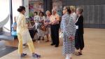 Museum docent leading a group tour