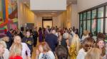 Large crowd of Museum members at an opening party